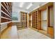 Spacious walk-in closet with custom shelving, drawers, and hanging racks for organization at 333 30Th N Ave, St Petersburg, FL 33704
