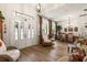 Elegant foyer with hardwood floors and a dining area at 3402 Melissa Country Way, Lutz, FL 33559