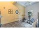 A dedicated workout space with exercise equipment and a bright, airy atmosphere at 3402 Melissa Country Way, Lutz, FL 33559