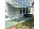 Exterior of home features covered porch with awning and storage box at 4020 55Th N St # 1106, Kenneth City, FL 33709