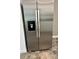 Stainless steel Whirlpool side-by-side refrigerator with ice and water dispenser at 4020 55Th N St # 1106, Kenneth City, FL 33709