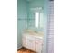 Bathroom with sink, vanity, and large mirror at 413 Lake Point Ct # 4B, Sun City Center, FL 33573