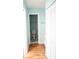 Hallway that shows a bathroom and a storage closet at 413 Lake Point Ct # 4B, Sun City Center, FL 33573