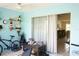 Enclosed lanai with tile floor and sliding door to the interior at 413 Lake Point Ct # 4B, Sun City Center, FL 33573