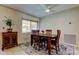 Inviting dining area featuring a wooden table, four chairs, and decorative rug, bathed in natural light at 4300 31St N Ave, St Petersburg, FL 33713