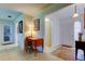 Welcoming foyer with tile flooring, a desk, and seamless access to the living spaces at 4300 31St N Ave, St Petersburg, FL 33713