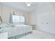 Bedroom featuring soft carpeting and double closets at 4304 Place Le Manes, Lutz, FL 33558