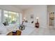 Inviting living room with a cozy seating area and sliding glass doors leading to the outdoor patio at 4304 Place Le Manes, Lutz, FL 33558