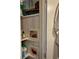 Organized closet shelves with toiletries and decor at 44 77Th Ave, Treasure Island, FL 33706