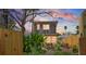 Charming two-story home with lush landscaping and unique architectural details at 44 77Th Ave, Treasure Island, FL 33706