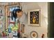 An eclectic kitchen space with vintage decor, hanging cookware, and a view to the outside at 44 77Th Ave, Treasure Island, FL 33706