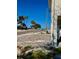 Charming street view of the neighborhood near the beach with palm trees at 44 77Th Ave, Treasure Island, FL 33706