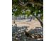 Street view of the neighborhood with palm trees in a beach town at 44 77Th Ave, Treasure Island, FL 33706