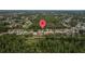 Aerial view of a quiet neighborhood with houses nestled among the lush greenery at 4505 Anaconda Dr, New Port Richey, FL 34655