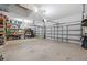 Spacious garage with ample storage shelving and multiple garage doors at 4505 Anaconda Dr, New Port Richey, FL 34655