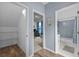 Hallway leading to a walk-in closet, office and bathroom at 4505 Anaconda Dr, New Port Richey, FL 34655
