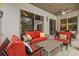 Covered patio area with comfortable seating and a view of the pool at 4505 Anaconda Dr, New Port Richey, FL 34655
