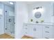Modern bathroom showcasing a glass-enclosed shower, sleek vanity, and stylish fixtures at 4605 W Loughman St, Tampa, FL 33616