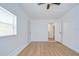 Bedroom with natural light and a large window, modern flooring and doorways at 4605 W Loughman St, Tampa, FL 33616