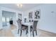 Modern dining area with stylish decor and light wood-look flooring at 4605 W Loughman St, Tampa, FL 33616
