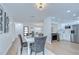 Open-concept layout with a modern kitchen, dining area, and stylish decor at 4605 W Loughman St, Tampa, FL 33616