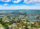 Beautiful aerial view of the coastline, community, and waterways at 5904 Pelican Bay S Plz, Gulfport, FL 33707