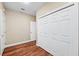 Bedroom featuring hardwood floors and a closet at 5904 Pelican Bay S Plz, Gulfport, FL 33707