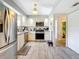 Well-lit kitchen featuring stainless steel appliances and tile flooring, perfect for cooking enthusiasts at 5920 80Th N St # 406, St Petersburg, FL 33709