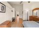 Bedroom showcasing wood floors, high ceilings and hallway entrance view at 6336 Bayside Key Dr, Tampa, FL 33615
