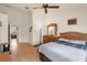 Bedroom showcasing wood floors, high ceilings and hallway entrance view at 6336 Bayside Key Dr, Tampa, FL 33615