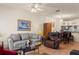 Bright living room featuring hardwood floors and plenty of seating at 6336 Bayside Key Dr, Tampa, FL 33615