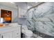 Beautiful bathroom with a modern glass shower, white marble style tile, and sleek fixtures at 6460 101St N Ave, Pinellas Park, FL 33782