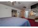 Spacious main bedroom with red carpet and an ensuite bathroom at 6460 101St N Ave, Pinellas Park, FL 33782