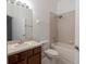 Bathroom featuring a vanity with a sink, a toilet, and a shower over tub at 6940 47Th N Way, Pinellas Park, FL 33781