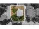 Aerial view of the property, lot lines outlined, highlighting its location and surrounding landscape at 8009 Somerset Ln, Tampa, FL 33615