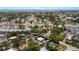 Aerial view of neighborhood with surrounding streets and residential houses near local businesses at 8009 Somerset Ln, Tampa, FL 33615