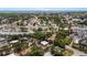 Neighborhood aerial showcases proximity to beaches, shops, and surrounding residential streets at 8009 Somerset Ln, Tampa, FL 33615