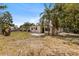 Backyard featuring a patio and grass at 8009 Somerset Ln, Tampa, FL 33615