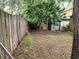 Large fenced backyard with shed, offering a private outdoor space at 8313 Arabian Dunes Pl, Riverview, FL 33578
