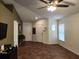 Inviting living room featuring tile flooring and abundant natural light at 8313 Arabian Dunes Pl, Riverview, FL 33578