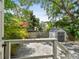 View of the backyard featuring a shed, partial gravel cover, and lush landscaping at 848 9Th S Ave, St Petersburg, FL 33701