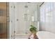 Bright bathroom featuring a glass shower, soaking tub, and stylish accents creating a spa-like retreat at 848 9Th S Ave, St Petersburg, FL 33701