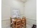 Cozy dining area with natural light, wood table, and view of the backyard at 848 9Th S Ave, St Petersburg, FL 33701