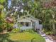 Charming single-story home with a manicured front yard and inviting porch at 848 9Th S Ave, St Petersburg, FL 33701