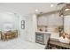Spacious kitchen with an adjacent dining area, featuring modern appliances and stylish décor at 848 9Th S Ave, St Petersburg, FL 33701