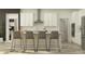 Kitchen featuring an island with seating, stainless steel appliances, and sleek cabinetry at 9414 Gladsome Dr, Land O Lakes, FL 34637