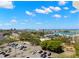 A beautiful aerial view showcasing the property's proximity to waterfront and nearby parking at 9425 Blind Pass Rd # 1008, St Pete Beach, FL 33706