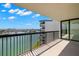 This spacious condo balcony provides stunning waterfront views and ample natural light at 9425 Blind Pass Rd # 1008, St Pete Beach, FL 33706
