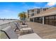 Community deck with lounge chairs and beautiful water views at 9425 Blind Pass Rd # 1008, St Pete Beach, FL 33706
