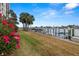 Dockside living at its finest, with boat access and stunning waterfront views surrounded by lush greenery at 9425 Blind Pass Rd # 1008, St Pete Beach, FL 33706
